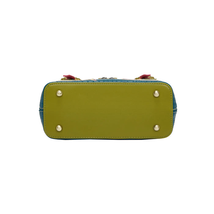Green handbag with decorative elements on a white background