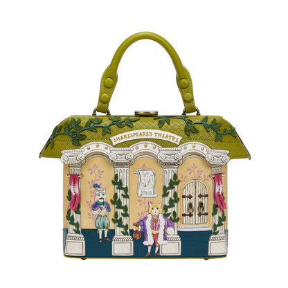 Decorative handbag with theater-themed design on a white background