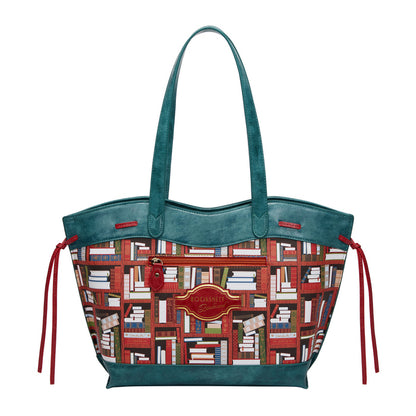 Tote bag with bookshelf pattern and teal top handle on a white background