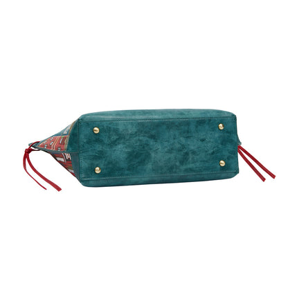 Green handbag with red straps on a white background