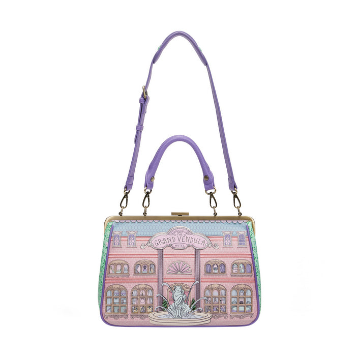 Handbag with a building design and 'David Yurman' branding on a white background
