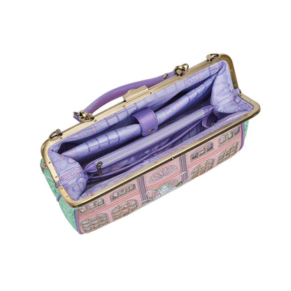 Colorful handbag with intricate design on a white background