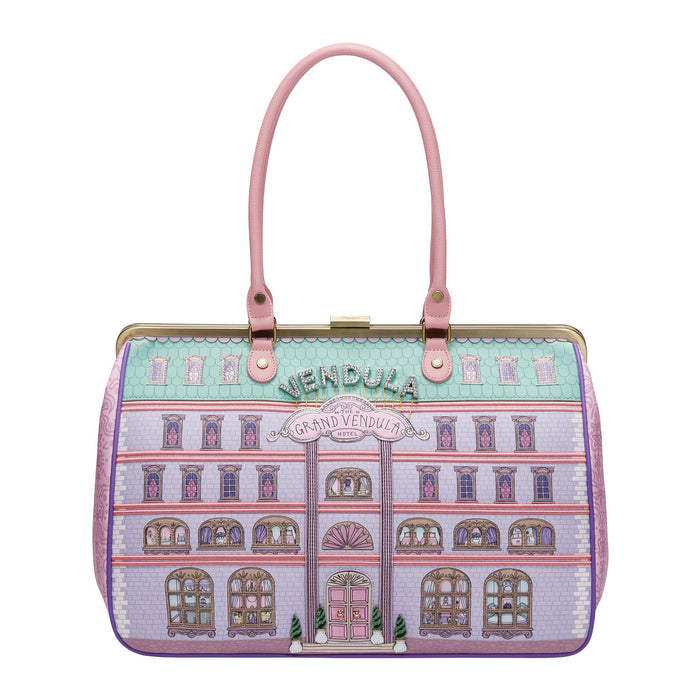 Handbag with architectural design and 'Grand Vendula' text on a white background