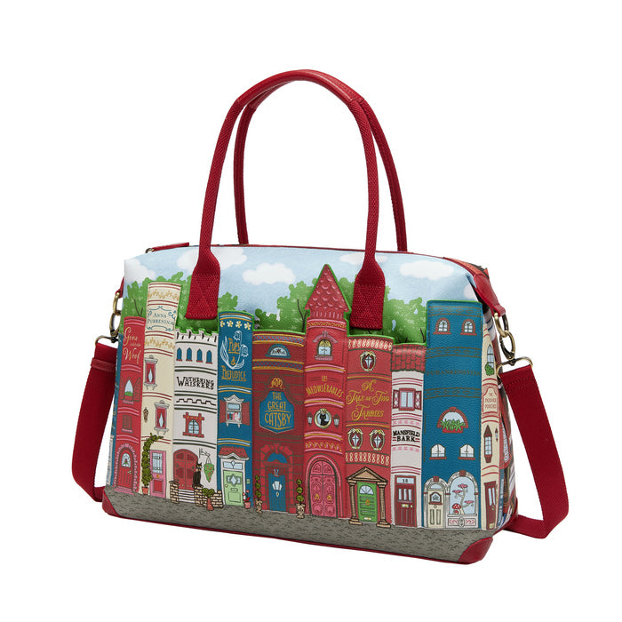 Handbag with colorful cityscape design on a white background