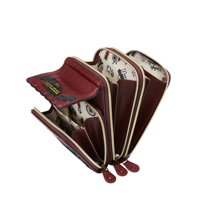 Open brown leather wallet with floral lining on a white background