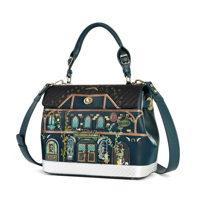 A dark teal leather handbag featuring a detailed architectural illustration of 'The Chinese Garden' on the front flap, with gold accents and a white textured base, shown on a plain white background.