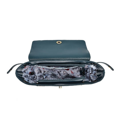 An open dark teal leather clutch bag with a patterned gray and white interior lining, shown against a plain white background.