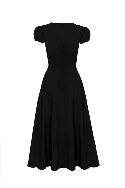 A black short-sleeve midi dress with a fitted bodice and flared skirt, shown from the back on a plain white background.