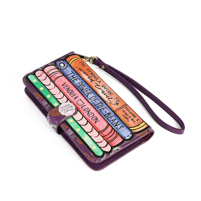 A purple leather wristlet wallet featuring a colorful, illustrated book cover design with text such as 'The Power of 106-Beams' and 'Venice to London,' plus a matching purple wrist strap on a white background.