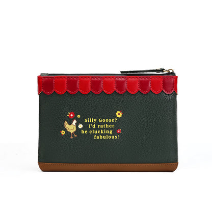 A dark green textured leather pouch with a red scalloped trim along the top zipper, a brown leather base, and a yellow embroidered chicken and text reading 'Silly Goose? I'd rather be flucking fabulous!'.