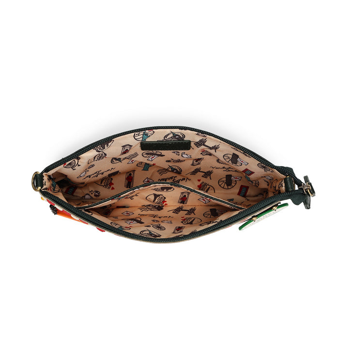 An open zippered pouch or clutch shown from above on a white background, revealing a beige interior printed with small illustrated motifs and black trim along the zipper.