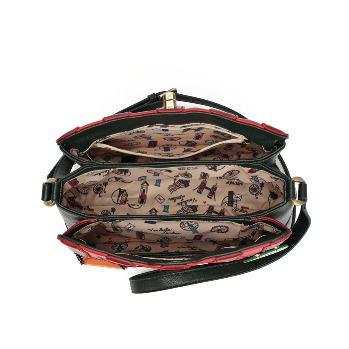 An open black leather shoulder bag with gold-tone hardware, showing a beige patterned interior lining with small fashion-themed illustrations. The bag has red piping along the edges and a black strap, photographed against a plain white background.