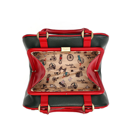 A structured handbag shown open from above on a white background, with dark green exterior, bright red trim and handles, gold-tone hardware, and a beige patterned interior lined with the brand name 'Victoria London'.