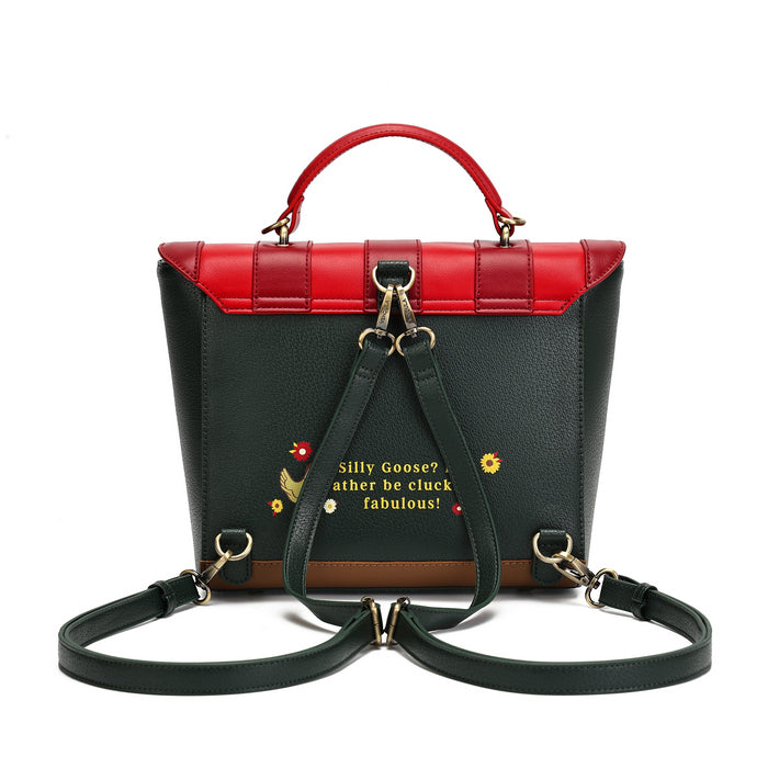 A structured handbag with a dark green pebbled body, a bright red top handle and upper flap, a dark green shoulder strap, and small embroidered floral details with gold text on the front.