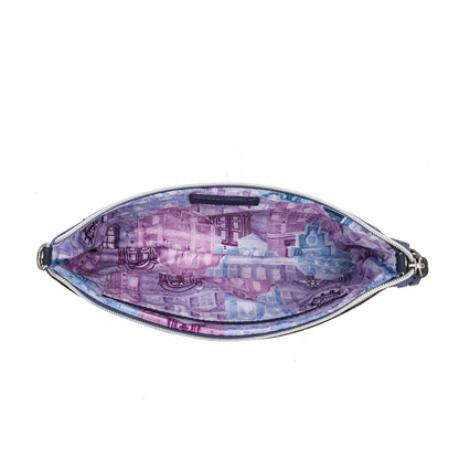 The interior of a zippered pouch or belt bag, featuring a purple and blue watercolor-style cityscape print lining, shown against a plain white background.