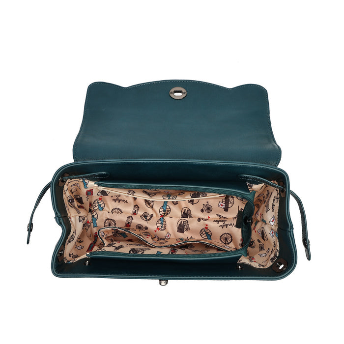 An open teal leather shoulder bag with a patterned beige interior lining featuring small illustrated motifs, shown against a plain white background.