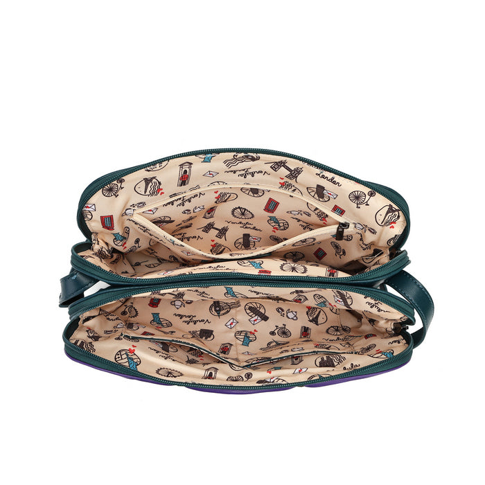 An open zippered cosmetic pouch or small bag shown from the inside, with a beige interior printed with small illustrated motifs and dark teal-green zipper trim.