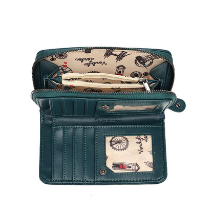 An open teal blue leather wallet with multiple compartments, a zippered pocket, and a patterned cream paper insert featuring London-themed illustrations.