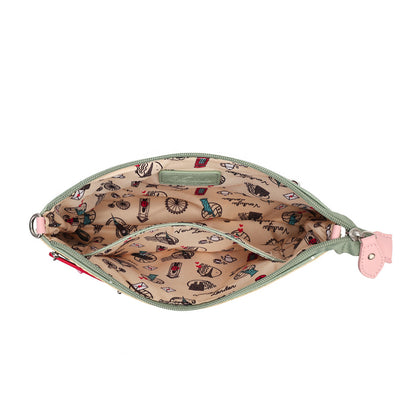An open zippered pouch or clutch shown from above on a white background, with a beige interior printed with small fashion-themed illustrations and a sage green zipper.