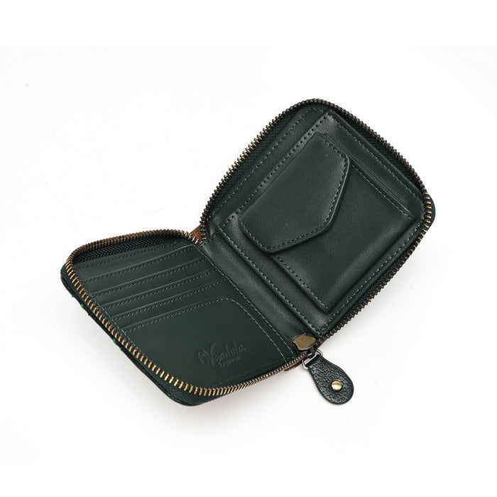 An open dark green leather zip-around wallet with multiple card slots, a slip pocket, and brass-tone hardware, photographed on a clean white background.