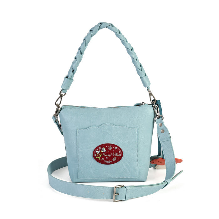 A practical crossbody with a top handle, detachable strap and a mix of internal and external pockets for everyday organisation. Printed and embossed vegan leather is finished with snowy toadstool houses, fairy doors, winter trees, rabbits and snowflakes.
