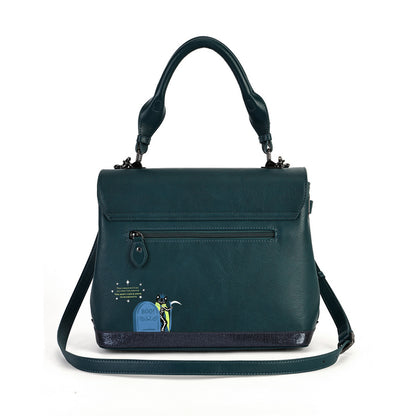 A dark teal green leather handbag with a top handle, front zip pocket, and a decorative blue and yellow tombstone illustration on the lower left corner, shown against a plain white background.
