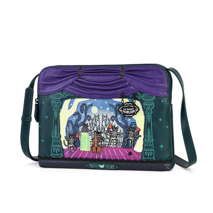 A purple and dark teal messenger bag featuring a detailed graphic illustration of a cat band performing on stage, with a purple faux-leather top panel and a dark teal shoulder strap.