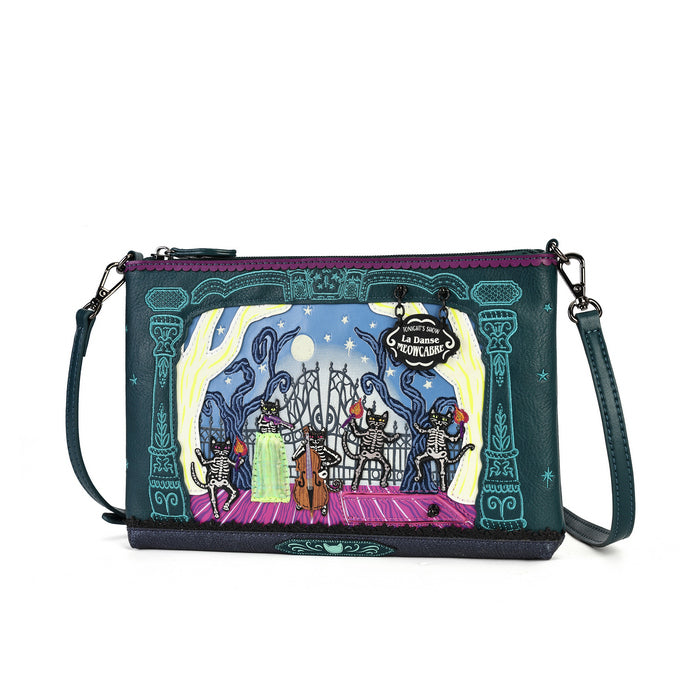 A dark teal faux-leather crossbody clutch bag featuring a colorful Day of the Dead (Dia de los Muertos) skeleton dance performance illustration on the front, with a purple zipper and a matching dark teal strap.