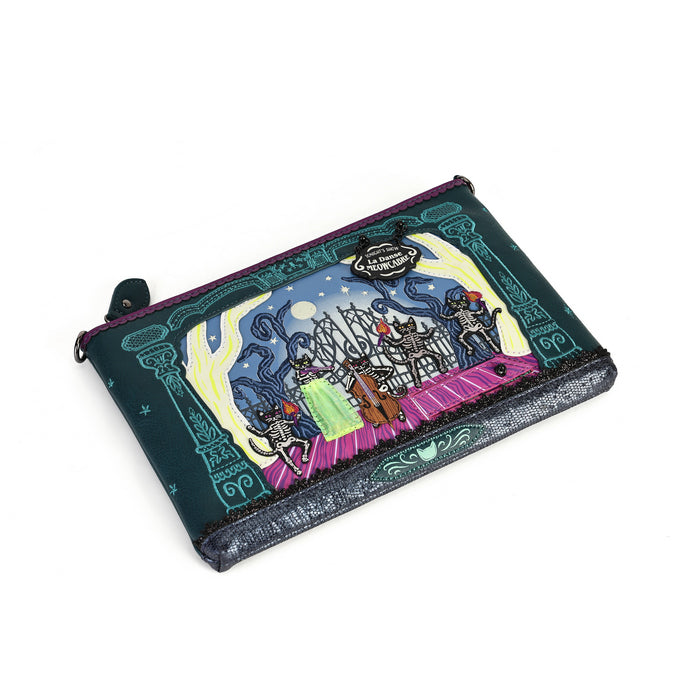 A small zippered pouch featuring a colorful illustration of a nighttime musical scene with a cello, moon, and decorative teal border details on a dark background.