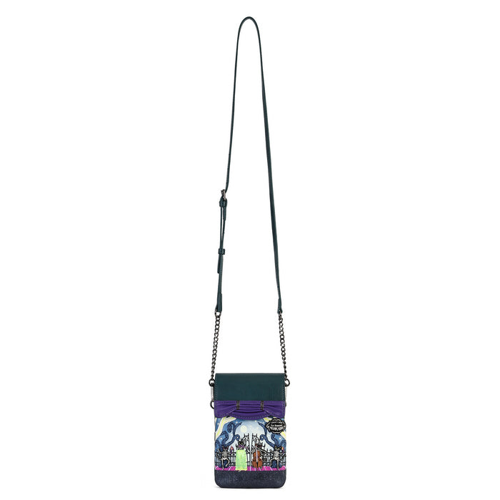 A small crossbody phone bag with a dark green body, a purple top flap, and a colorful graphic print on the front pocket. It features a long dark green shoulder strap with silver chain links on both sides, shown against a plain white background.