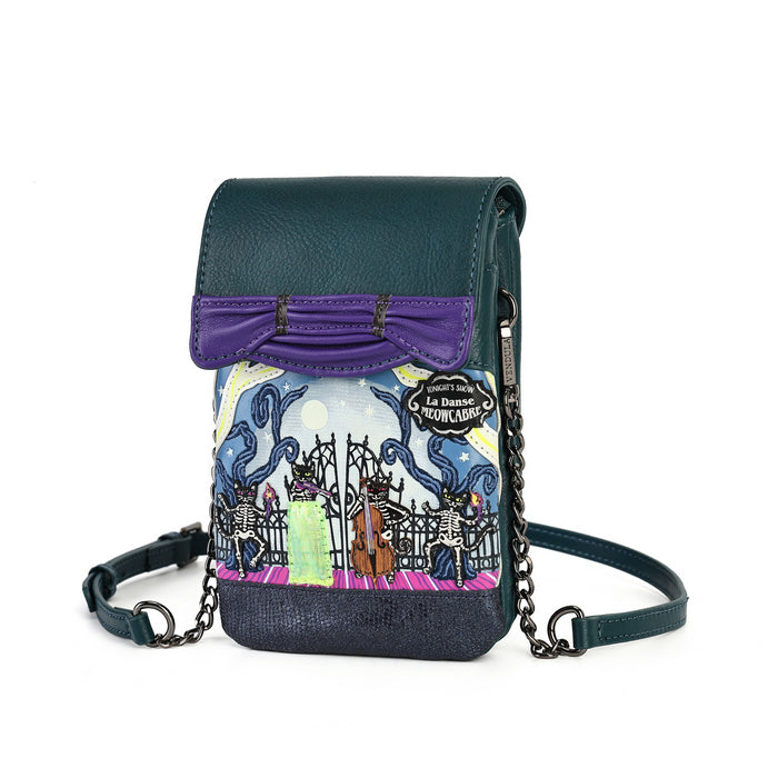 A small crossbody phone bag with a dark teal leather flap and strap, a purple bow detail, and a colorful illustrated front panel featuring a whimsical scene with the text 'La Dame Mon Léon'.