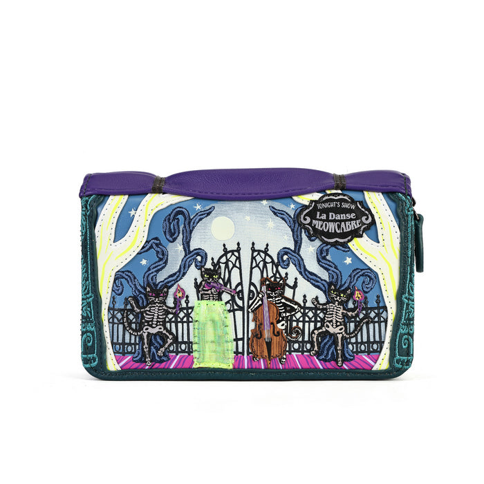 A rectangular zip pouch with a purple top handle, featuring a colorful gothic illustration of skeleton dancers and a gate on the front. A black hanging tag reads 'Disney's Fantasy La Danse des Monsters.
