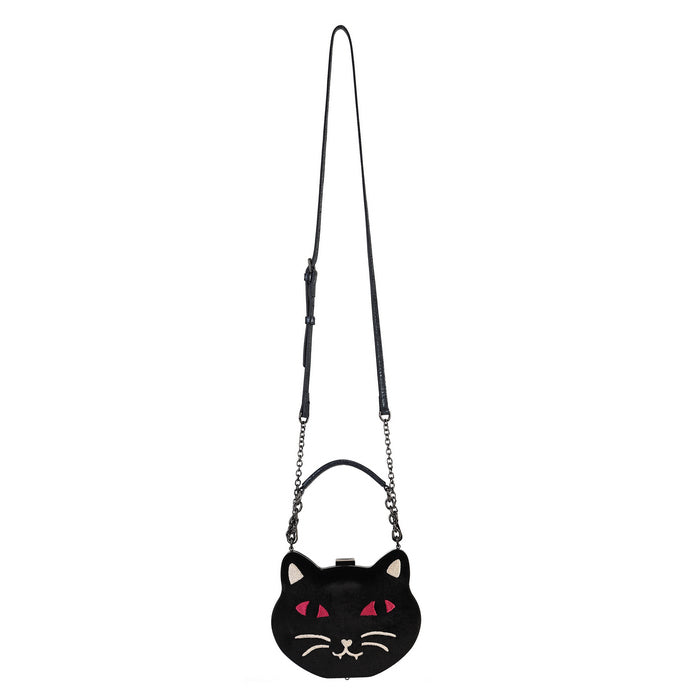 A black cat-shaped crossbody bag with a long shoulder strap, featuring embroidered red eyes, white whiskers, and white inner ears on a plain white background.