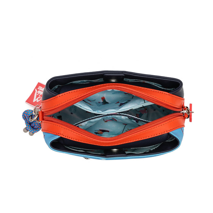 An open zippered pouch or small bag shown from above on a white background. The exterior is light blue and black, with a bright orange zipper running across the top.