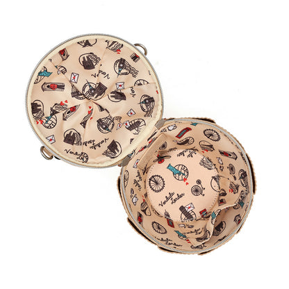 An open round zippered case shown from above, revealing a beige interior printed with illustrated vintage postcards, letters, and stamps. The exterior trim appears metallic silver.