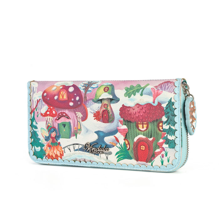 A rectangular zip-around wallet featuring a colorful whimsical winter forest illustration with mushroom houses, a fairy, and the brand name 'Vendula London' printed near the bottom.