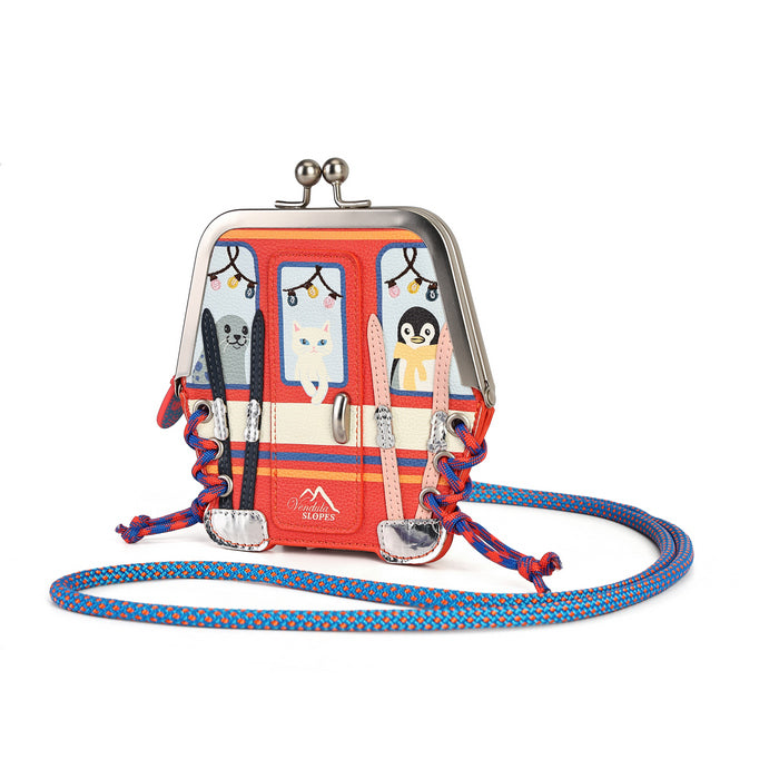 A small kiss-lock coin purse designed like a red and cream trolley bus, featuring cartoon animal characters in the windows. It has a blue braided shoulder strap and a silver-tone metal frame, shown on a plain white background.