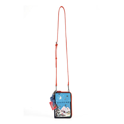 compact organiser with a front phone pocket, ziparound compartment, multiple internal pockets, mirror and detachable crossbody strap. Embroidery and appliqué add texture to artwork featuring snowy peaks, chalet scenes, gondolas and ski-route details.