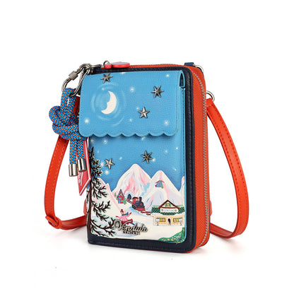 compact organiser with a front phone pocket, ziparound compartment, multiple internal pockets, mirror and detachable crossbody strap. Embroidery and appliqué add texture to artwork featuring snowy peaks, chalet scenes, gondolas and ski-route details.