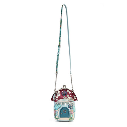 A mushroom-shaped crossbody bag with a long strap, featuring a burgundy cap with white floral patterns, a blue flower-shaped body, and silver-tone chain details, shown on a plain white background.