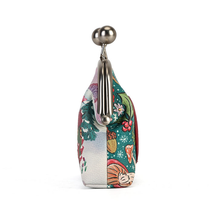 A compact clip-frame purse that can also be worn as a mini crossbody with the detachable chain strap. Embroidery, appliqué and internal card slots combine with snowy toadstool houses, fairy doors, winter trees, rabbits and snowflakes in a small but versatile design.