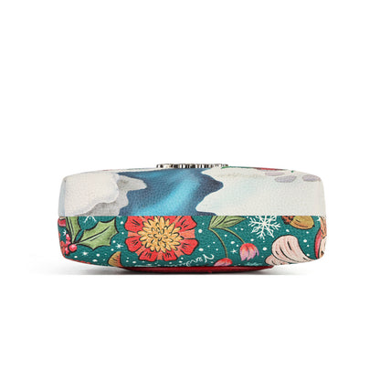 A compact clip-frame purse that can also be worn as a mini crossbody with the detachable chain strap. Embroidery, appliqué and internal card slots combine with snowy toadstool houses, fairy doors, winter trees, rabbits and snowflakes in a small but versatile design.