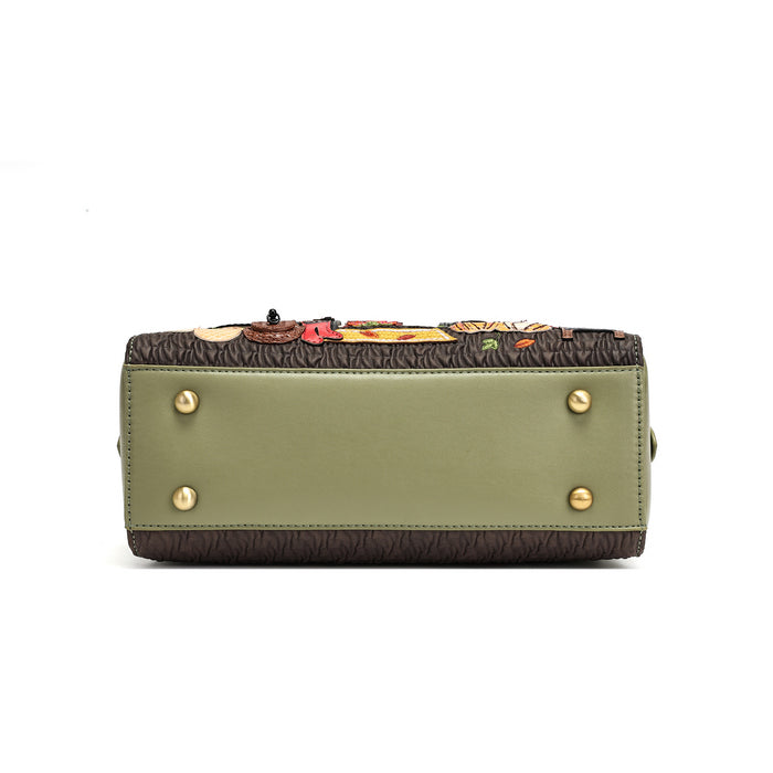 The bottom view of a handbag showing an olive green leather base, a dark brown textured patterned top, and gold-tone hardware studs.
