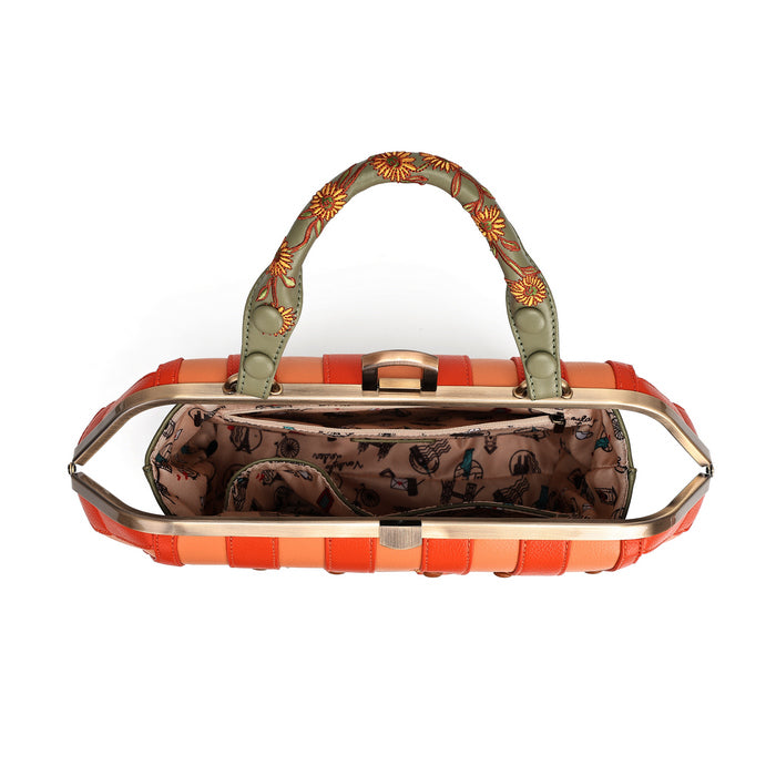 An open handbag with a bright orange and peach striped exterior, a patterned olive green handle, and a brown patterned interior, shown against a plain white background.