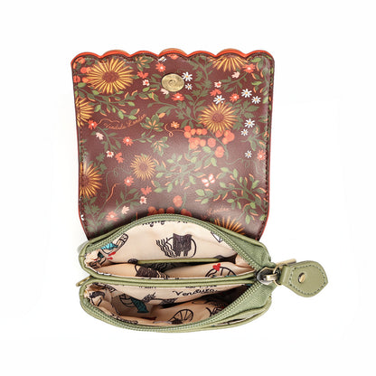 A small floral-patterned pouch shown open against a white background. The exterior is brown with a multicolor floral print in orange, yellow, green, and white, finished with scalloped edges and a snap closure.