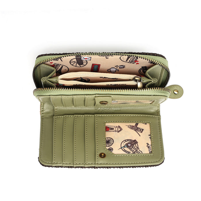 An open sage green faux leather wallet with multiple compartments, a zippered main section, and a patterned interior featuring vintage bicycle and lighthouse illustrations.