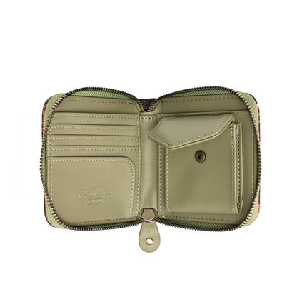 An open zip-around wallet shown from the inside, featuring an olive green leather interior with card slots, a pocket flap, and a snap button closure. The brand name 'Vachetta' is subtly embossed on the lower left pocket.