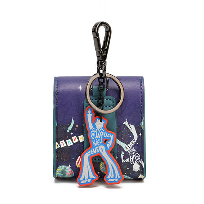 A small zip-around keychain wallet in purple and dark blue with a space-themed print, featuring a black carabiner clasp and a dangling blue, orange, and white 'Cowboy Nights' character charm on a white background.
