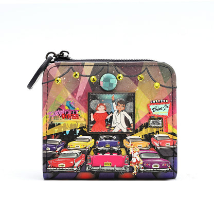 A zip-around coin purse featuring a colorful retro 1960s car scene illustration with classic cars, a stage, and neon signs, shown on a plain white background.