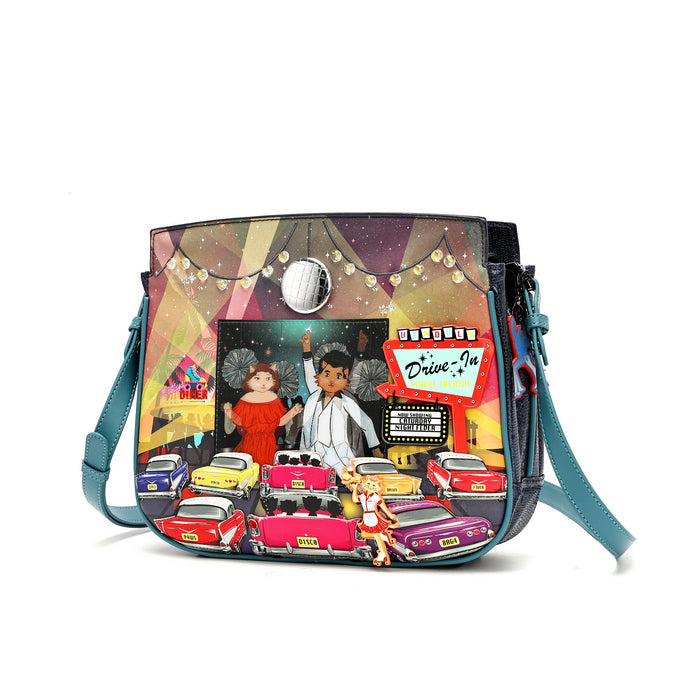 A rectangular shoulder bag with a colorful retro collage print featuring vintage cars, a disco ball, and dancing figures. The bag has a dark navy base, a teal strap, and a silver-tone snap closure.